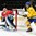 GRAND FORKS, NORTH DAKOTA - APRIL 23: Canada's Evan Fitzpatrick #1 makes the save as Sweden's Axel Jonsson Fjallby #16 looks for a rebound during semifinal round action at the 2016 IIHF Ice Hockey U18 World Championship. (Photo by Minas Panagiotakis/HHOF-IIHF Images)

